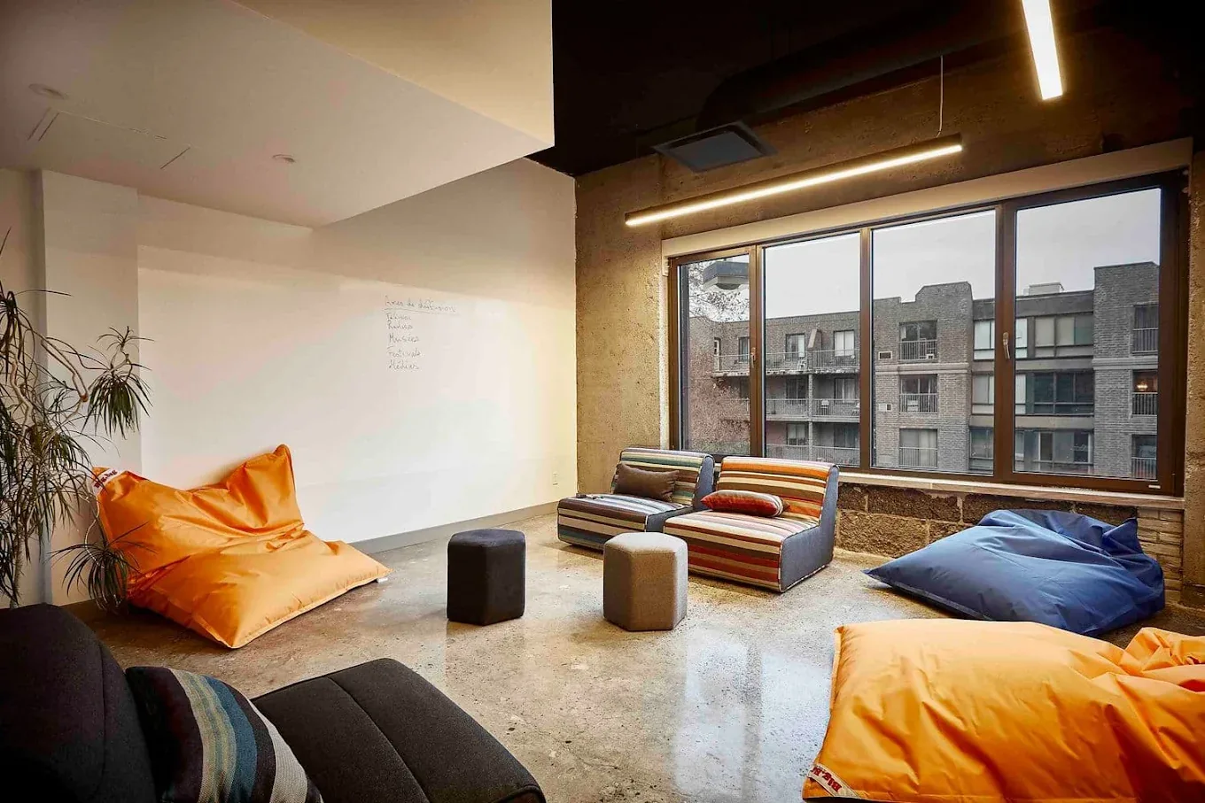 Casual breakout space with seating in the Webtec workspace